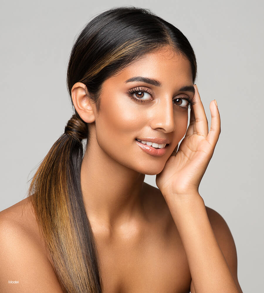 Young ethnic woman with high cheek bones