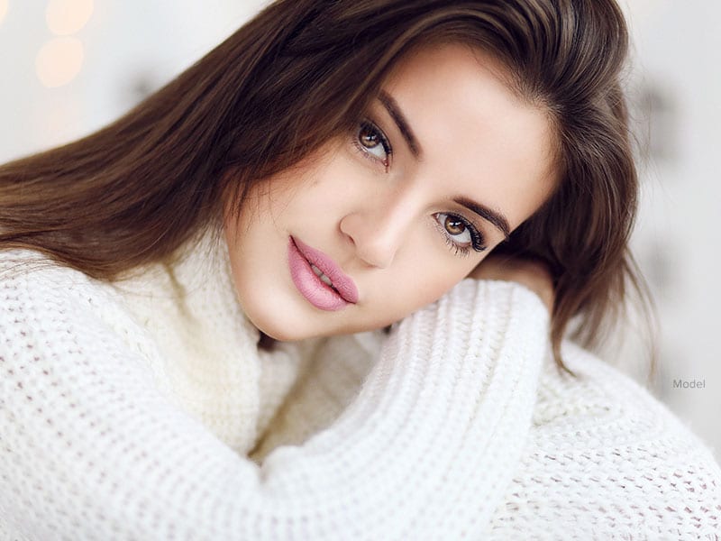 Beautiful woman in cozy sweater