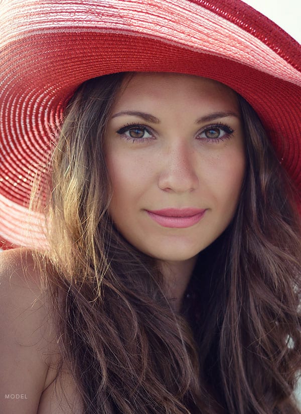 Beautiful woman in red hat